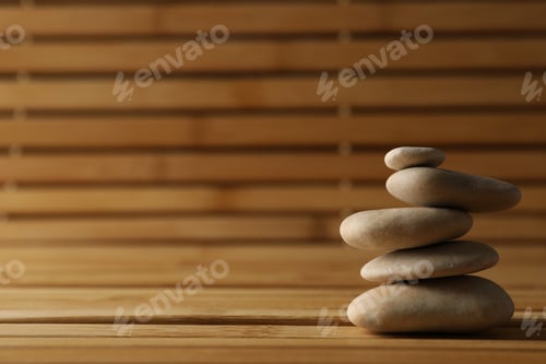 Preview: Stones on the bamboo background. Zen concept