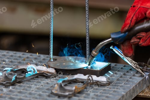 Preview: Details of welding activities - a welder is welding steel compon