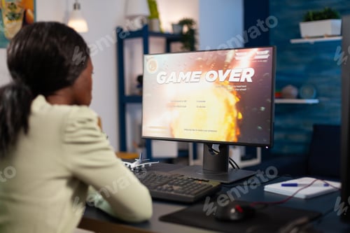 Preview: Upset pro gamer woman playing space shooter videogames