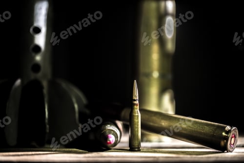 Preview: weapons, cartridge on wooden background