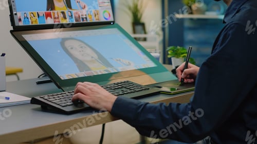Preview: Close up of photographer hands using retouching software