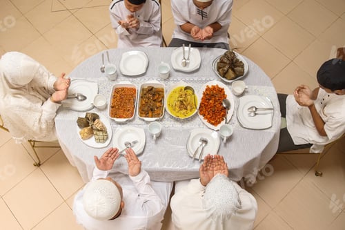 Preview: Top view muslim family are praying together