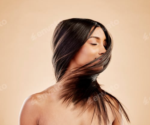 Preview: Woman, shake hair and beauty with growth, texture and shine with natural cosmetics on studio backgr