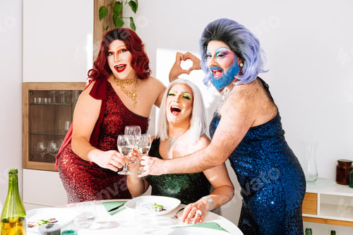 Preview: Joyful transgender women posing for a toast