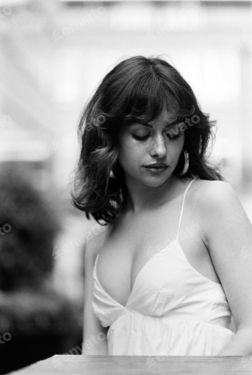 Preview: Romantic black and white portrait of feminine woman outdoors.