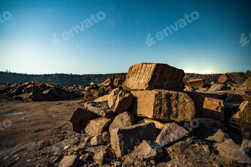 Preview: Large deposits of stone materials near a mine in the Carpathians against the background of the sky