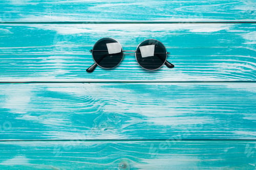 Preview: sun glasses on wooden table