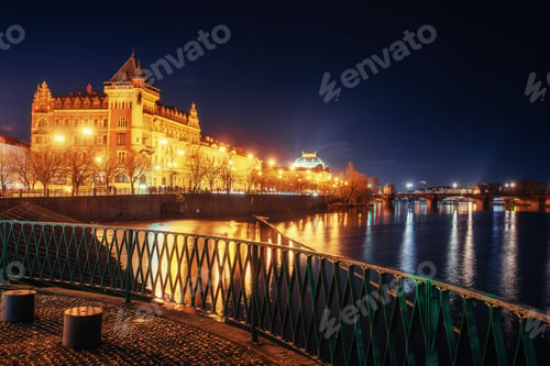 Preview: The magnificent Prague Castle at night along the River Vltava.