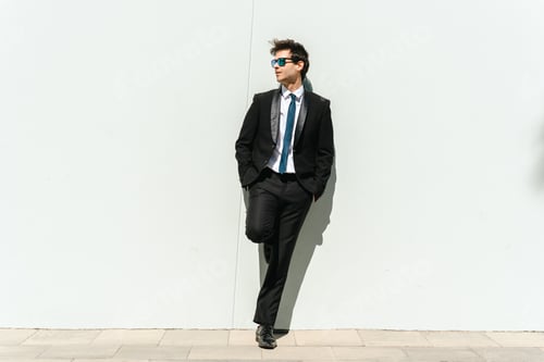 Preview: Handsome businessman with elegant suit outdoors portrait