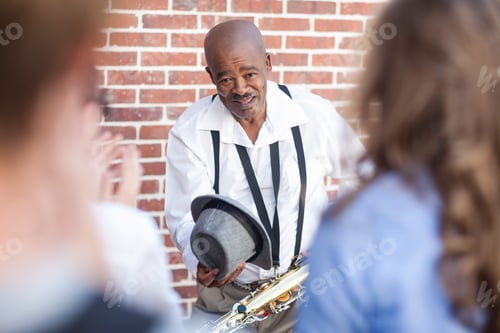 Preview: Street musician bowing to crowd