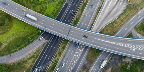 Preview: Aerial top view of highway junction interchange road. Drone view of the elevated road, traffic