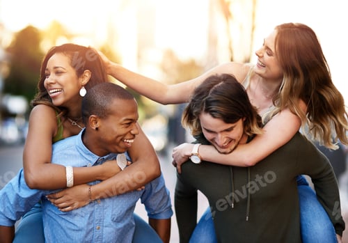Preview: Shot of two happy young couples going for a piggyback ride through the city together