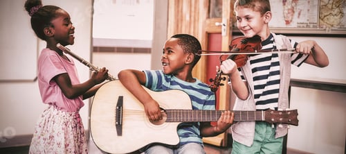 Preview: Children playing musical instruments in classroom