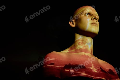 Preview: Shirtless Bald Man Standing in Projector Light Watching Atomic Explosion against Black