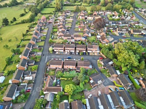 Preview: Aerial view of a quaint village nestled among roads in Worcestershire, England