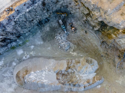 Preview: Drone shot of trucks working on construction site