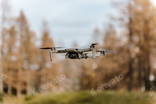 Preview: Close-up photo of small drone in air