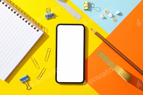 Preview: Phone with empty screen on color decorated background, top view