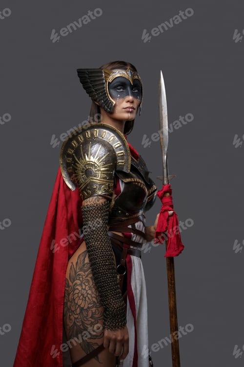 Preview: Tattooed woman warrior with red cape and spear