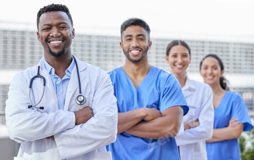 Preview: Shot of a group of doctors standing against a city background
