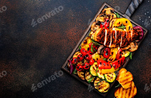Preview: Grilled chicken and vegetables. Bbq party. Colorful paprika, zucchini, eggplant, mushrooms