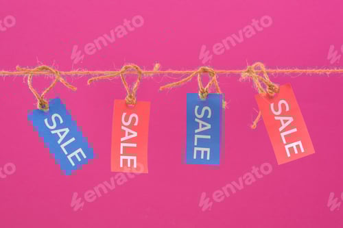 Preview: Vivid Sale Tags Hung on Twine String