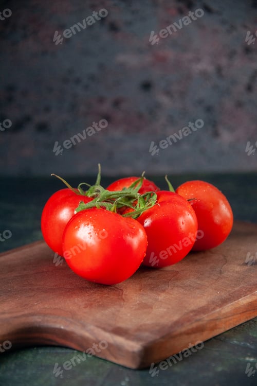 Preview: front view fresh red tomatoes on cutting board dark background salad food dinner ripe photo color