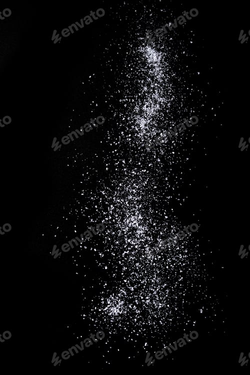 Preview: Sea salt over black background.