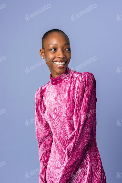 Preview: Happy black woman in a pink dress