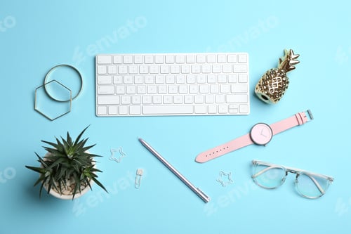 Preview: Blogger's workplace with keyboard and accessories on color background, top view