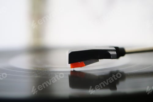 Preview: Record needle on record player playing music