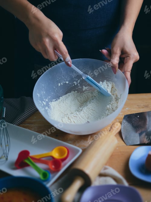 Preview: Chef mixes the flour in mixing bowl