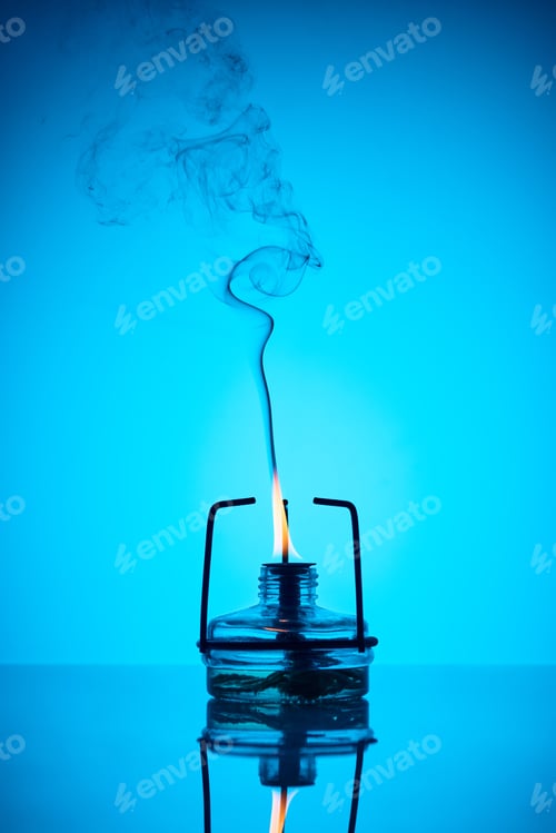 Preview: chemical heater with fire and smoke on blue