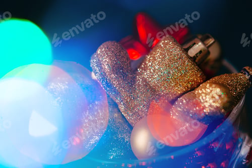 Preview: Christmas holiday background with festive decor bokeh shot
