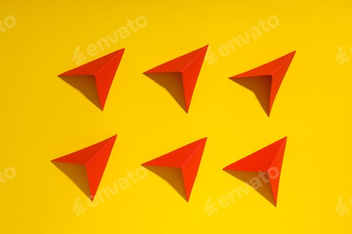 Preview: Business, startup and sponsorship concept with paper planes on yellow background