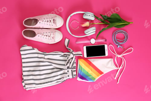 Preview: Flat lay composition with stylish summer clothes and accessories on pink background