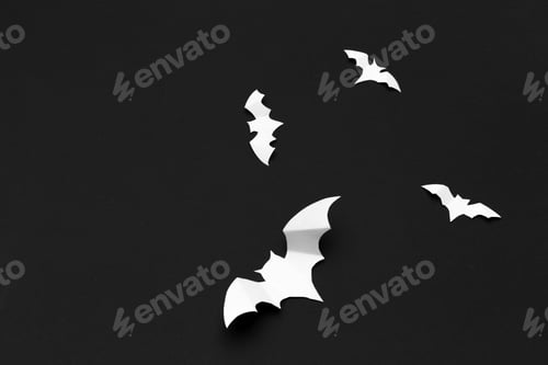Preview: halloween and decoration concept - paper bats flying