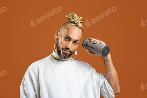 Preview: Black latin gay man isolated on orange background