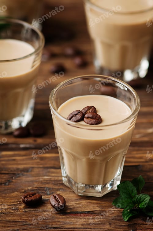 Preview: Cold cream with coffe and mint on the wooden table