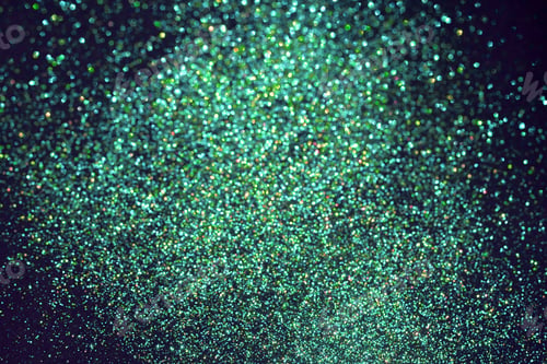 Preview: Vibrant green blurred sparkling glittering background. Festive backdrop.