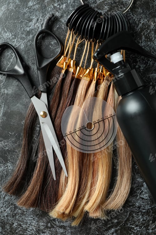 Preview: Composition with hair extension accessories on dark background