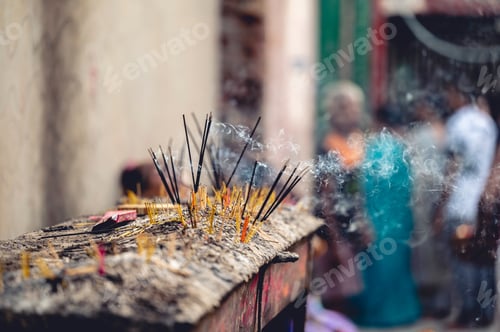 Preview: Closeup shot of burning incense sticks to show respect to the Gods at a Hindu temple