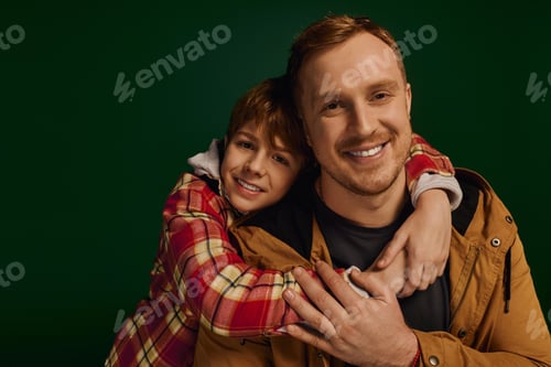 Preview: Happy moments captured between a father and son in a stylish studio setting