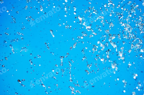 Preview: Blue water drops on blue sky background
