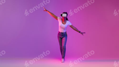 Preview: Black Woman In VR Headset Exploring Cyberspace Activities, Walking In Neon Light