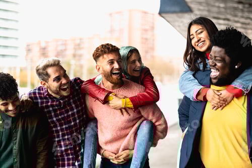 Preview: Young multi ethnic friends having fun together hanging out in the city