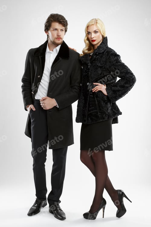 Preview: stylish man and glamour woman in fur coat posing