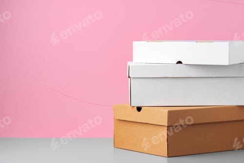 Preview: Set of cardboard boxes on pink background