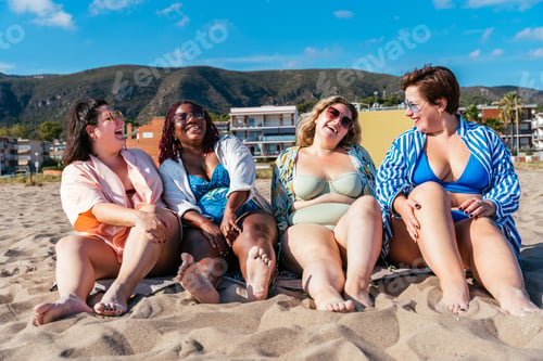 Preview: Group of plus size women with swimwear at the beach