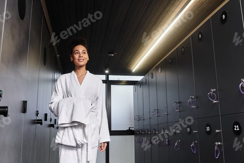 Preview: Relaxing moments of a young African American woman enjoying a spa day in a serene environment